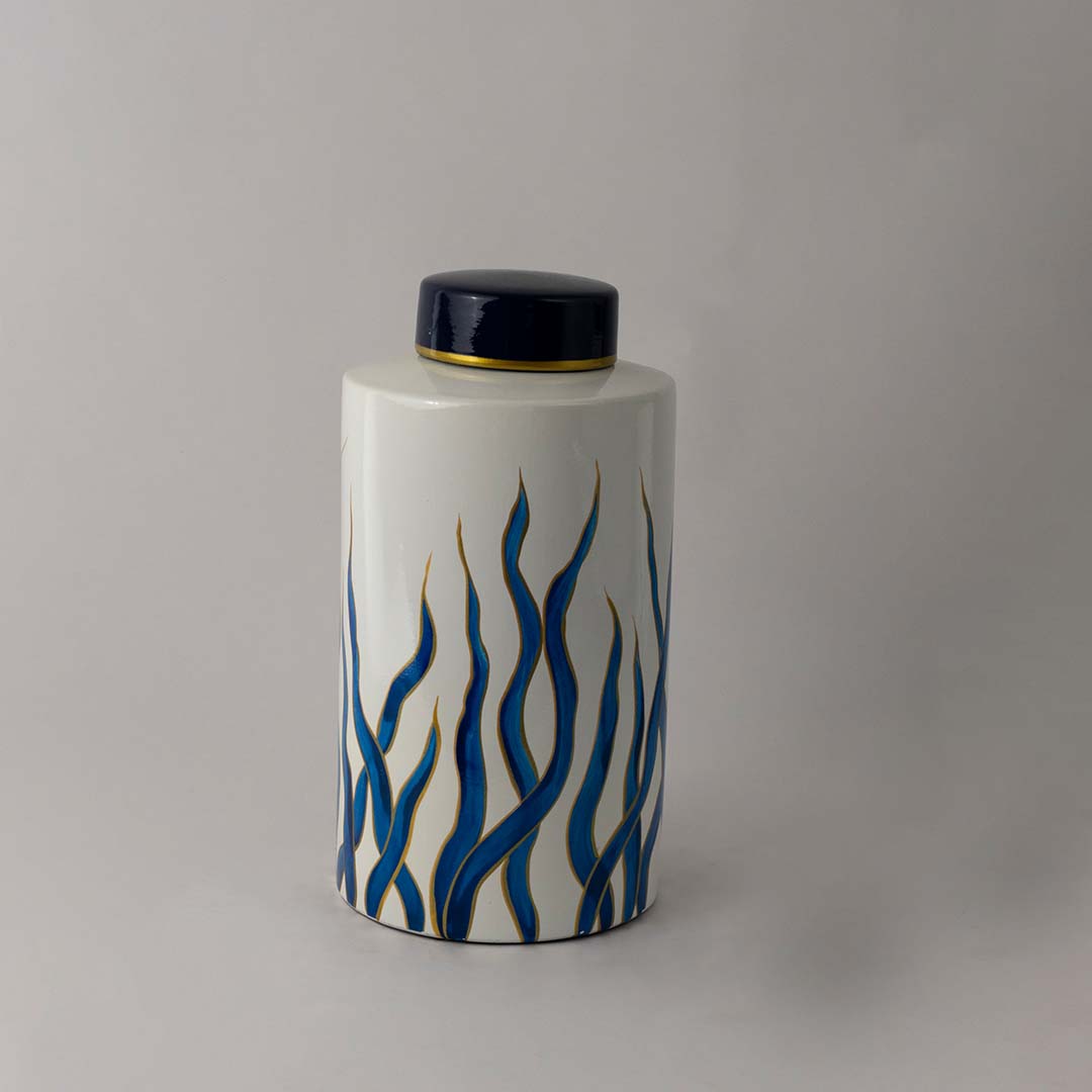 Handcrafted ceramic jar with blue and gold wave design ideal for luxury tabletop or interior home decoration.