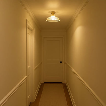 Modern ribbed glass ceiling light in hallway setting for warm ambient lighting and classic home decor spaces.