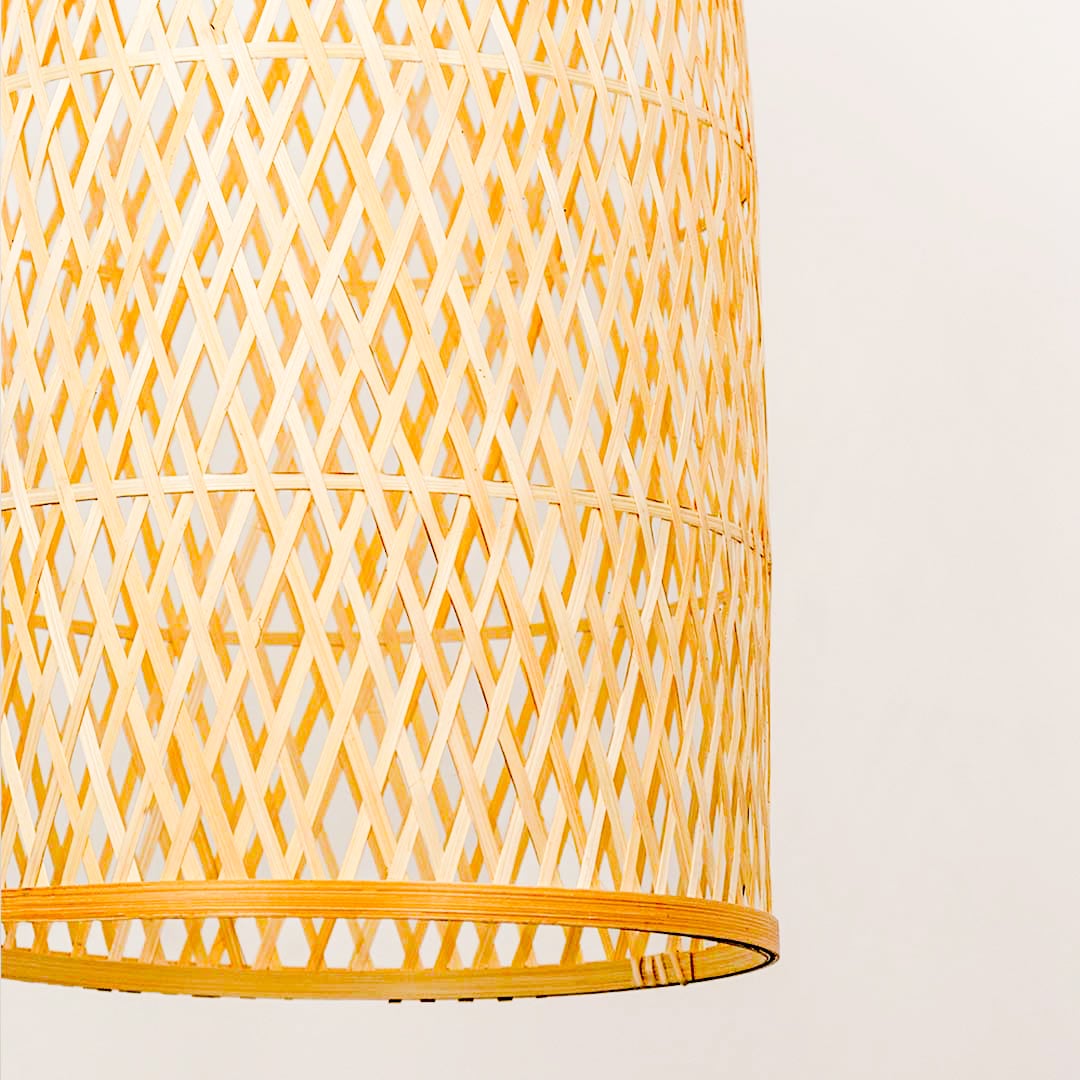 Detailed view of woven rattan pendant light highlighting intricate pattern and premium texture.