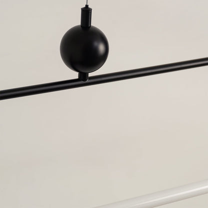 Black metal linear LED pendant light showcasing minimalist detailing and premium craftsmanship for modern ceiling lighting.