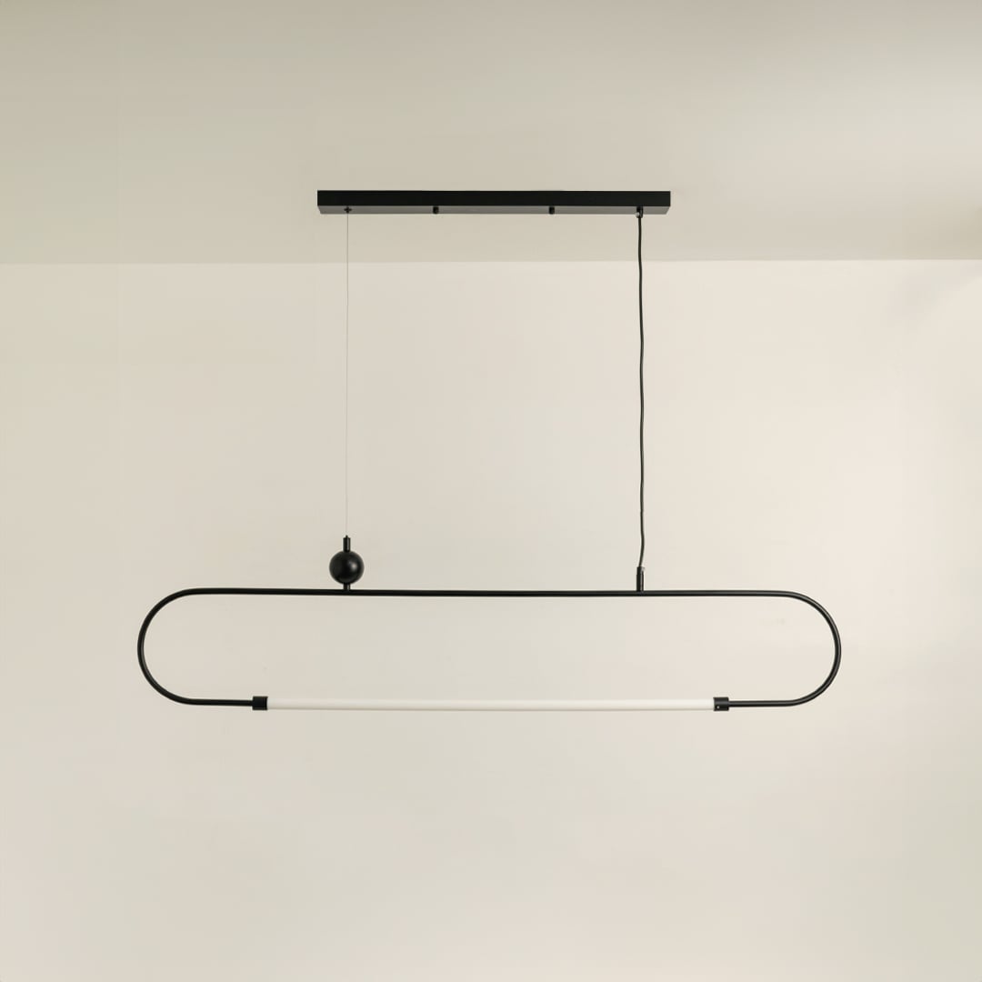 Black metal linear LED pendant light with integrated illumination designed for sleek contemporary ceiling lighting interiors.