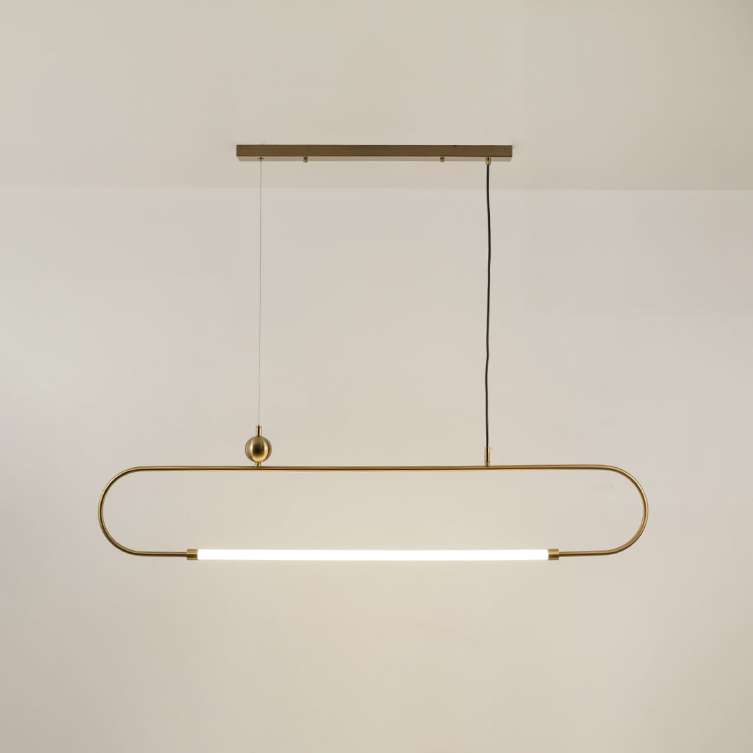 Gold metal linear LED pendant light with integrated illumination designed for elegant modern ceiling lighting indoors.