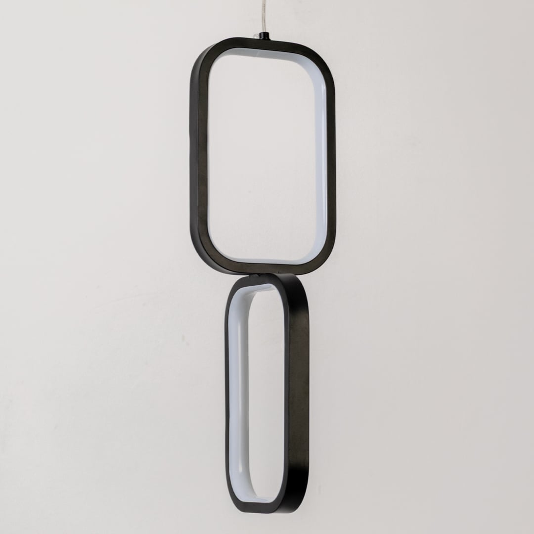 Closeup of black and white metal dual frame hanging light showing smooth finish and premium modern design detailing.