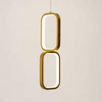 Gold metal LED wall light with linked oval frames for elegant bedroom and living room decor.
