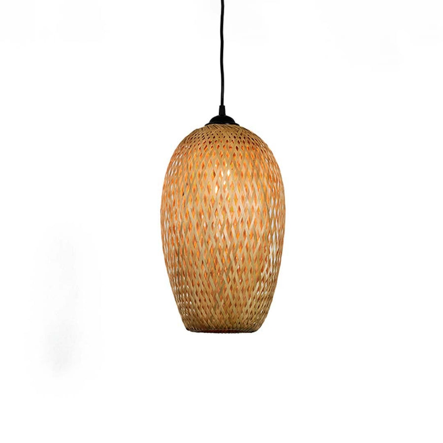 Bamboo pendant light glowing on white background with handwoven tall oval wicker shade for rustic home interiors.