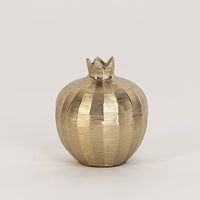 Textured metal decor bowl in gold finish with crown lid for table decor or shelf styling modern home placement white background.