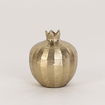 Textured metal decor bowl in gold finish with crown lid for table decor or shelf styling modern home placement white background.