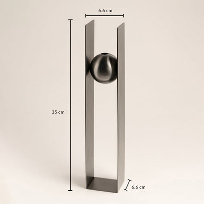 Dimensions of the Black Metal Sphere Vase are 35 cm in height and 6.6 cm in width highlighting its tall narrow and elegant structure.