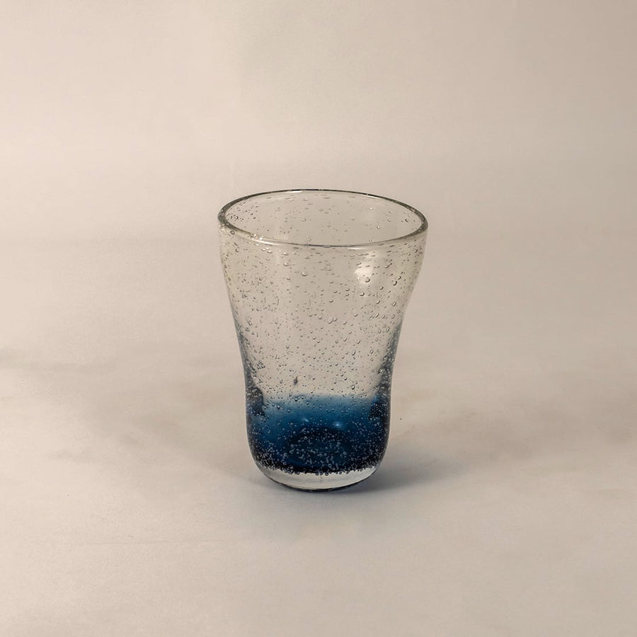 Side angle view of blue bubble glass vase highlighting its gradient color transition and handcrafted design.