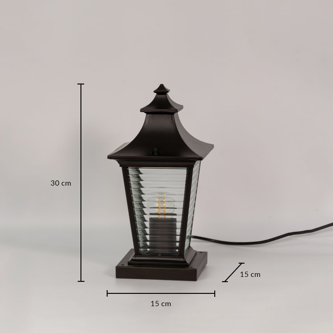 Outdoor pillar light in black metal with ribbed glass shown with dimensions 30 cm height and 15 cm width on white background.