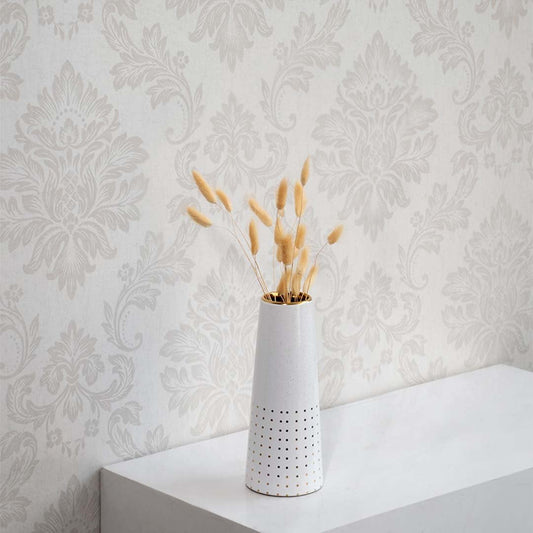 Natural beige bunny tail stems arranged on a white background offering a simple modern accent for interior decor.
