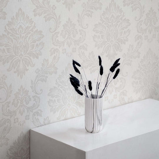 Black dried bunny tail grass stems in ceramic vase on white background modern decorative home accent.
