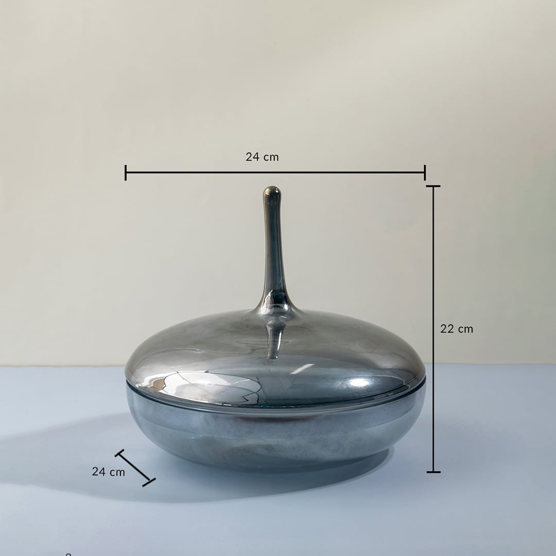 Grey glass jar with tall lid shown with 22 cm height and 24 cm width measurements for modern decorative use.