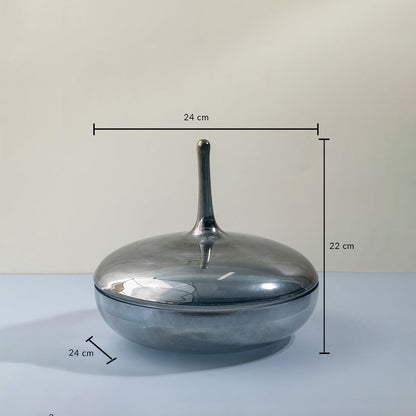 Grey glass jar with tall lid shown with 22 cm height and 24 cm width measurements for modern decorative use.