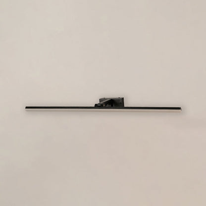 Black metal picture light on a white background with the light off highlighting its minimal modern design.