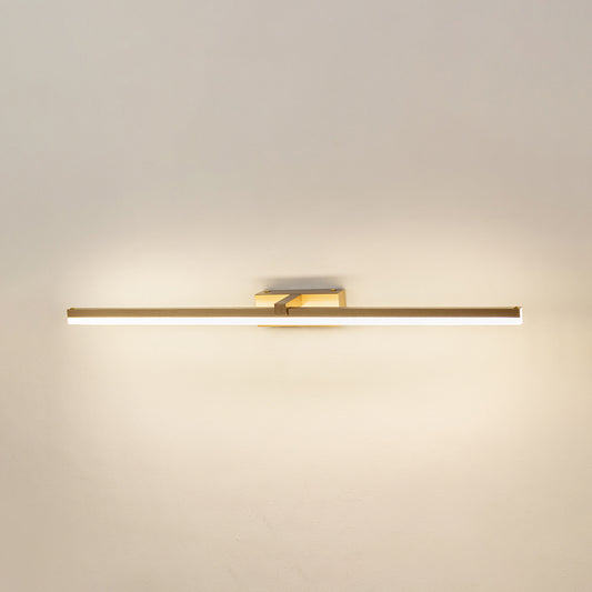 Modern wall light in gold metal finish with linear bar design for bathroom or vanity decor lighting white background.