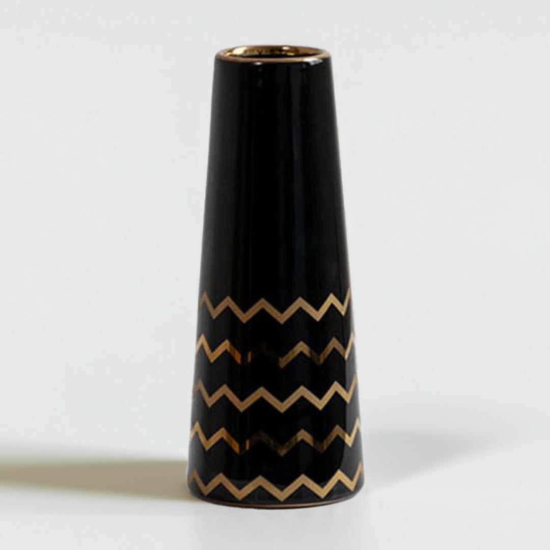 Black ceramic decorative vase with gold zigzag detailing and tapered silhouette for elegant modern home decor styling.