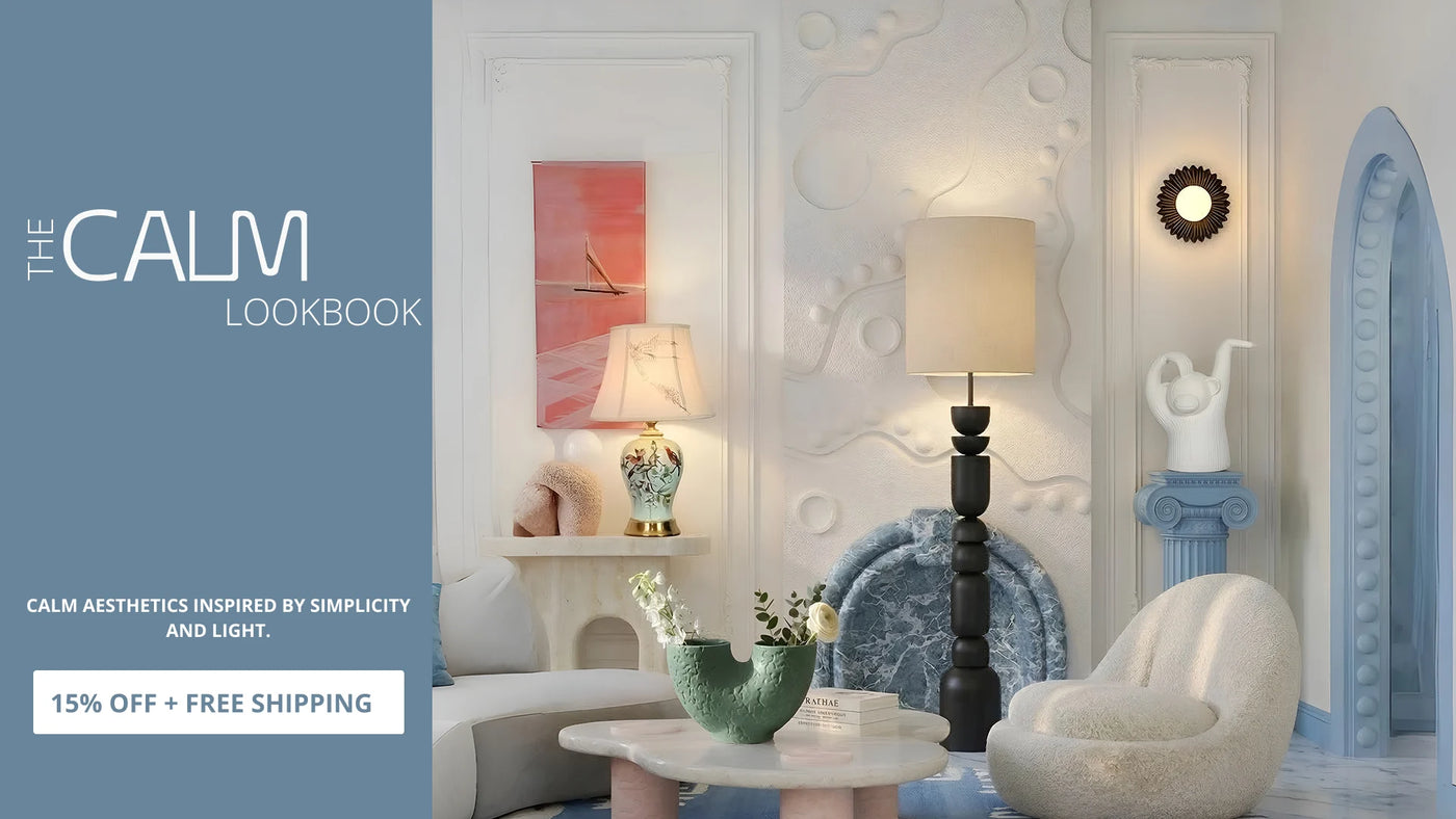 Living room with modern decor, featuring a couch, coffee table, and wall art. Ad for 'The Calm Lookbook' with promotional text.