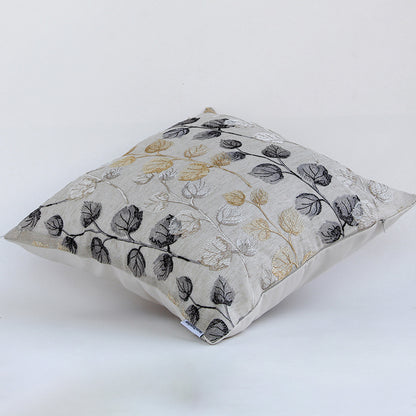 Leaf embroidered cotton cushion shown on a clean white background showcasing fine stitched details and elegant botanical patterns ideal for decor styling.