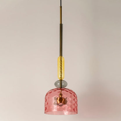 Pink hammered glass pendant light with gold accents crafted for elegant contemporary living spaces.