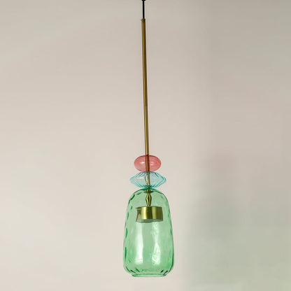 Mint green ribbed glass pendant light with coral accents crafted for stylish modern interiors.