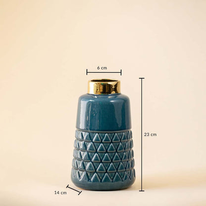 Technical diagram showing the dimensions of the blue ceramic vase which are 23 cm in height 6 cm top width and 14 cm bottom width.