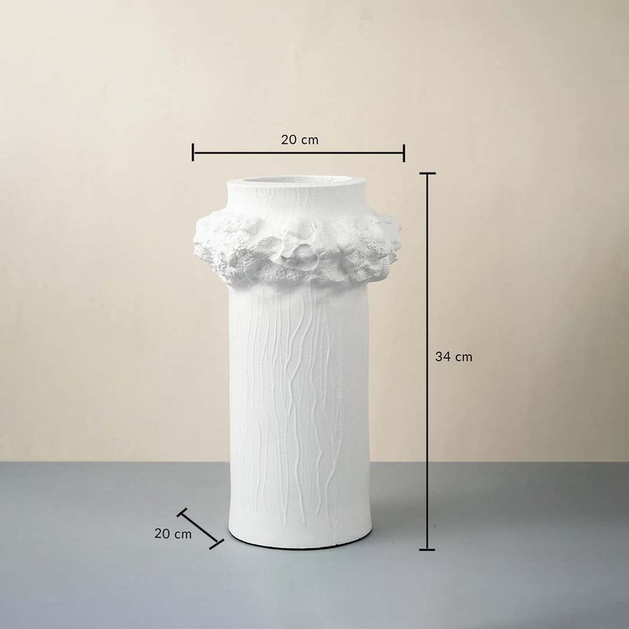 White ceramic vase with floral crown design 34 cm height and 20 cm width ideal for table decor and home styling.