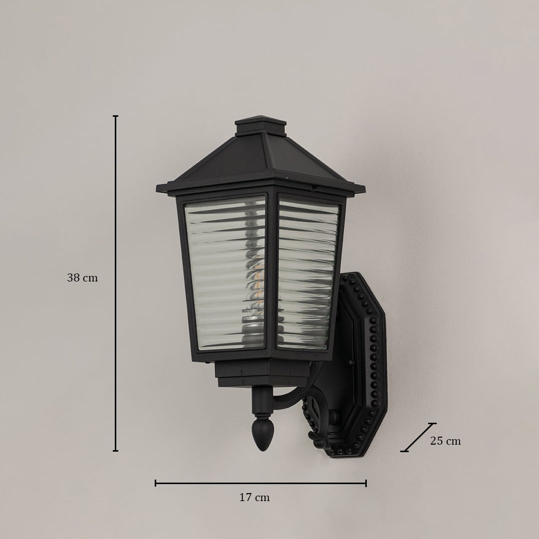 Traditional black outdoor wall lantern with ribbed glass measuring 38cm height 17cm width and 25cm projection bracket specifications.