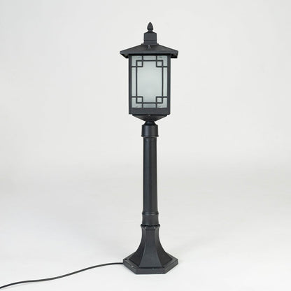 Black outdoor garden light with frosted glass panels for stylish exterior decor styling use.