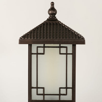 Black outdoor lantern Closeup seeded glass Light On showing the warm ambient glow and decorative pebbled glass panels detail.