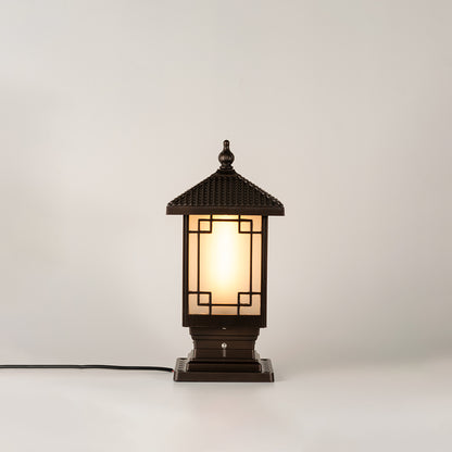 Vintage black outdoor gate light with warm ambient glow for luxury exterior decor styling use.