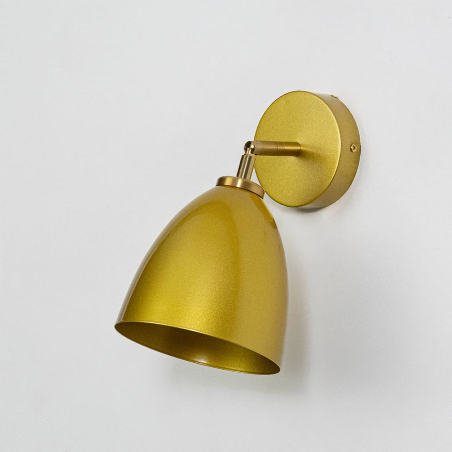 Table lamp wall light shown in light off condition on white background featuring metal body in gold finish for modern indoor wall decor.
