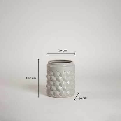 Grey ceramic vase with geometric texture shown with measurements 18.5 cm height and 16 cm width to provide accurate size details.