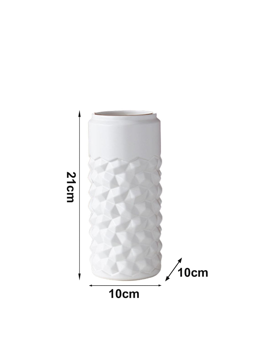 White ceramic vase with geometric texture shown with measurements 21 cm height and 10 cm width providing accurate size information.