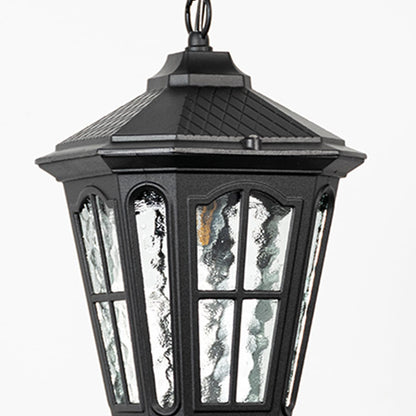 Closeup of hanging lantern light highlights textured glass panels and durable black frame designed for weather-resistant outdoor lighting.