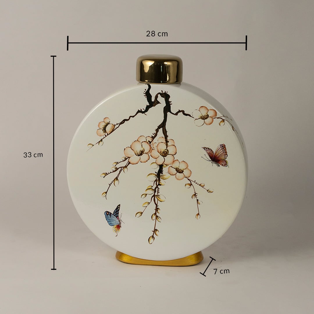 Round ceramic jar measuring 33 cm in height and 28 cm in width featuring floral branch and butterfly artwork.