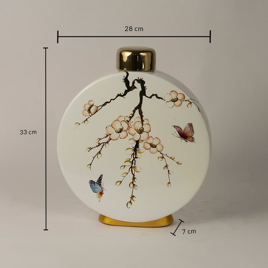 Round ceramic jar measuring 33 cm in height and 28 cm in width featuring floral branch and butterfly artwork.