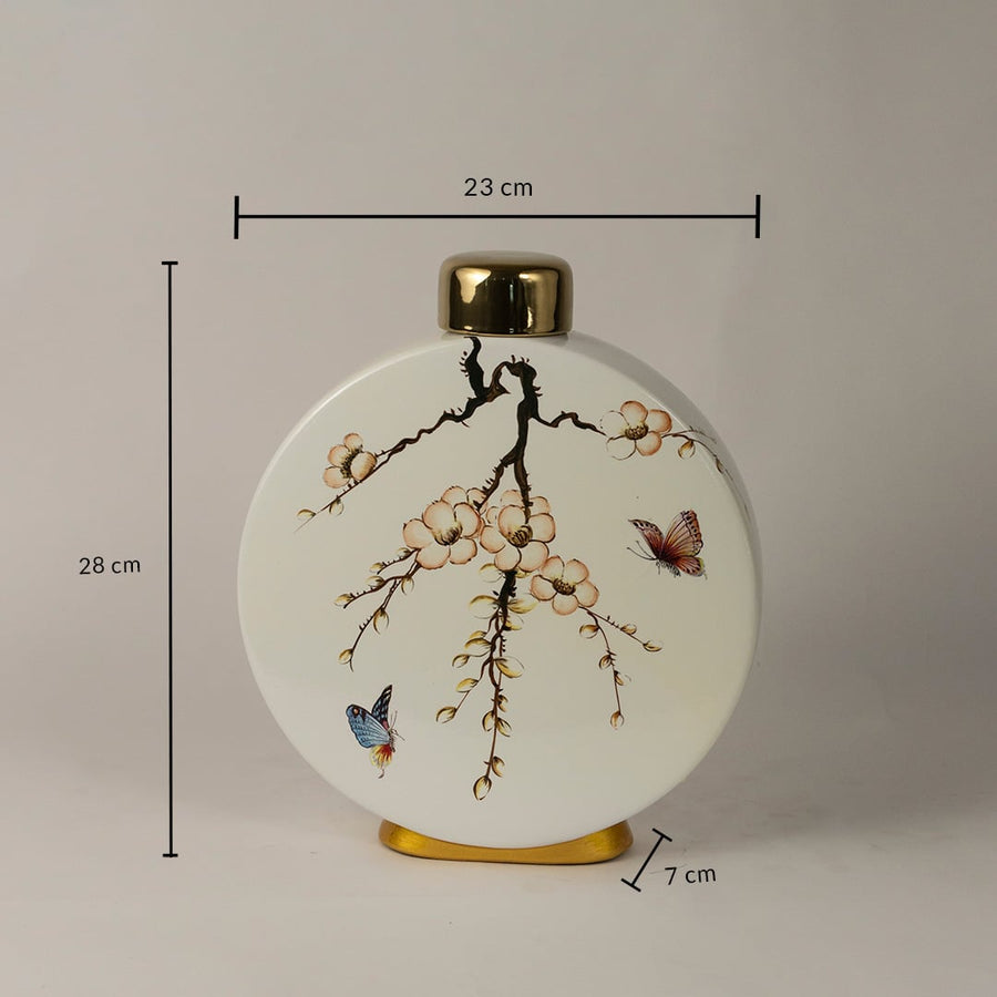 Round ceramic jar measuring 28 cm in height and 23 cm in width with elegant floral and butterfly design.