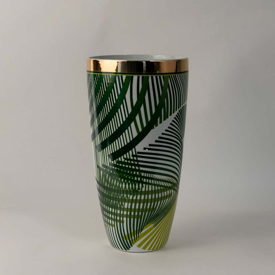 Tall ceramic vase with green tropical palm leaf design and golden rim styled for modern living room decoration on white background.