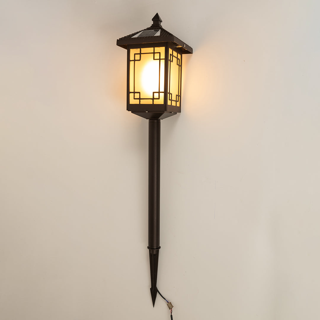 Vintage black outdoor garden light with glowing panels for stylish exterior decor styling use.