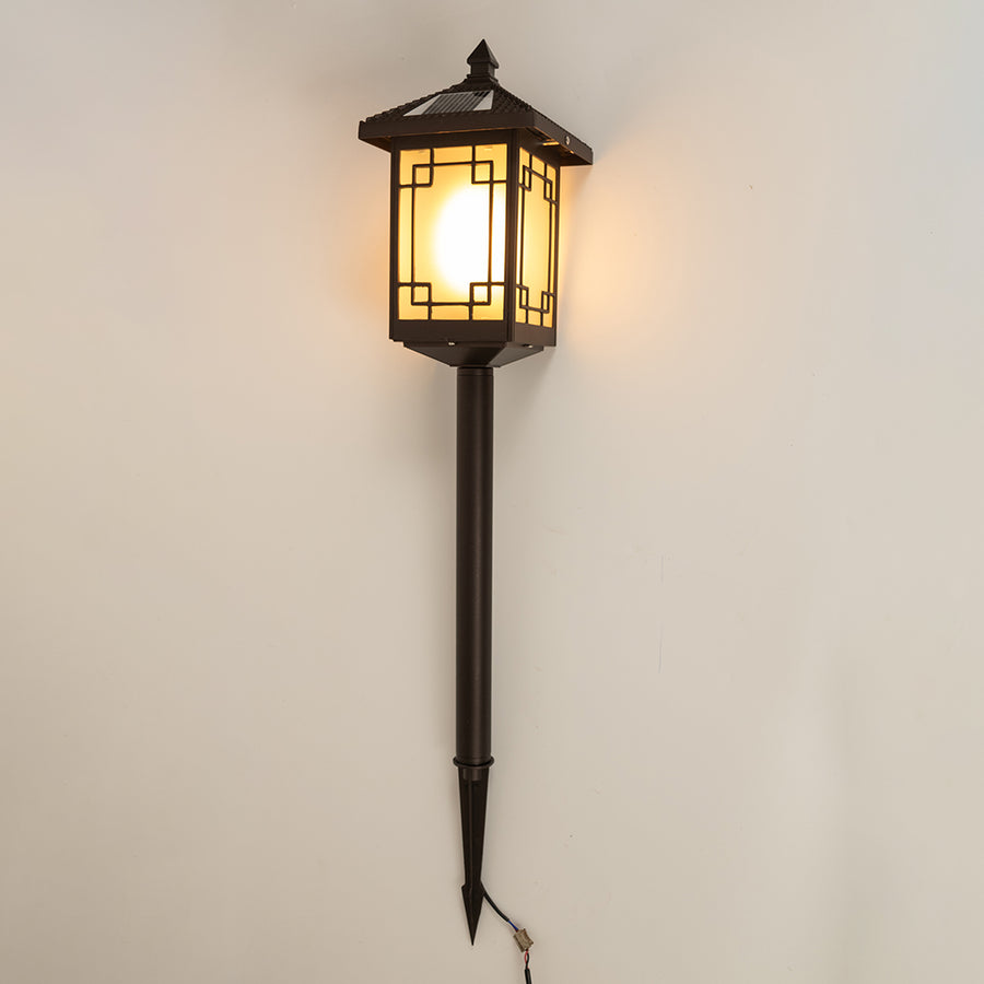 Vintage black outdoor garden light with glowing panels for stylish exterior decor styling use.