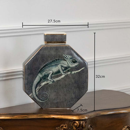 Decorative ceramic jar with lizard artwork shown with dimensions 27.5 cm width and 20 cm height.