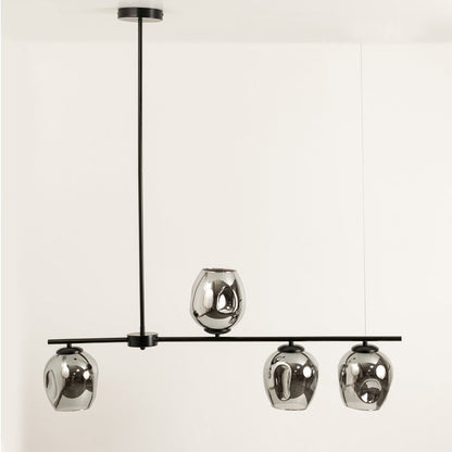 Chrome glass chandelier displayed on white background with lights off showcasing metallic globes and refined geometric design.