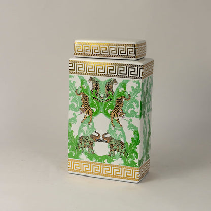Side angle view of white ceramic jar showing gold trim and intricate hand-painted tiger design.