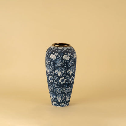 Blue floral ceramic vase with golden rim ideal for enhancing home interiors and modern decorative accents.