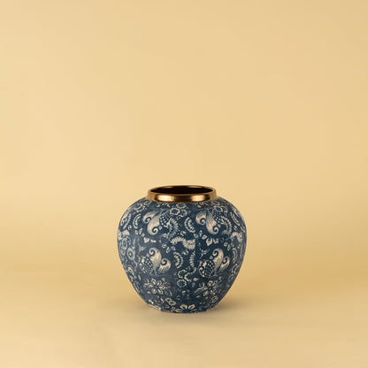 Handcrafted blue ceramic vase with floral paisley pattern and golden rim in luxury design for modern home decoration.