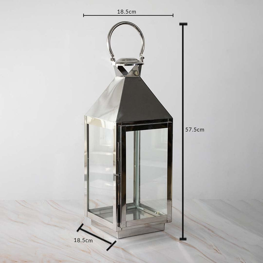 Large silver lantern dimensions 57.5cm height and 18.5cm width with stainless steel body and glass panels.