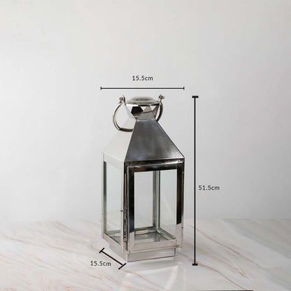Tall silver lantern dimensions 51.5cm height and 15.5cm width with stainless steel body and glass sides.