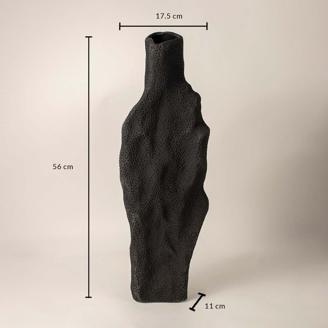 Black textured ceramic vase measuring 56 cm height 17.5 cm width and 11 cm depth displayed on white background.