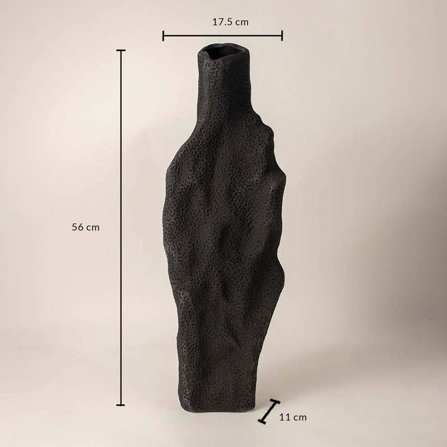 Black textured ceramic vase measuring 56 cm height 17.5 cm width and 11 cm depth displayed on white background.